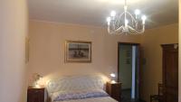 A bed or beds in a room at Al Pic de Corone
