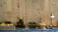 a table with a bunch of different types of food at Silverland Yen Hotel in Ho Chi Minh City