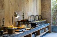 a buffet line with food on a table at Silverland Yen Hotel in Ho Chi Minh City
