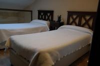 Postel nebo postele na pokoji v ubytování Apartamentos Valle&Snow