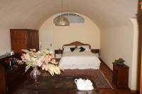 A bed or beds in a room at Fiamma Apartment