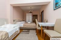 Postel nebo postele na pokoji v ubytování Hotel Joso
