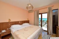 Postel nebo postele na pokoji v ubytování Hotel Joso