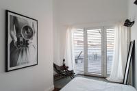 Posteľ alebo postele v izbe v ubytovaní Industia Loft Apartment