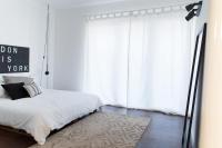 Posteľ alebo postele v izbe v ubytovaní Industia Loft Apartment