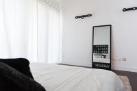 Posteľ alebo postele v izbe v ubytovaní Industia Loft Apartment