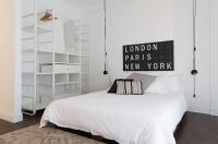 Posteľ alebo postele v izbe v ubytovaní Industia Loft Apartment