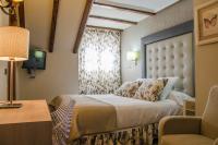 Postel nebo postele na pokoji v ubytování Hotel Presa