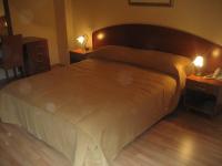 Postel nebo postele na pokoji v ubytování Apartment & Room Angerona