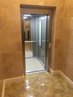 a walk in shower in a room with a glass door at Hotel Arnia in Iaşi