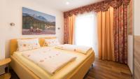 Posteľ alebo postele v izbe v ubytovaní Apartments Presslauer - Mori