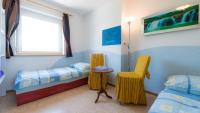 Posteľ alebo postele v izbe v ubytovaní Apartments Presslauer - Mori