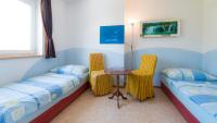 Posteľ alebo postele v izbe v ubytovaní Apartments Presslauer - Mori