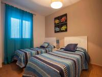 Postel nebo postele na pokoji v ubytování Livingtarifa Apartamento Los Lances