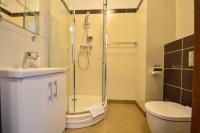 Kúpeľňa v ubytovaní Apartamenty na Wyspie - Aquamarina - Budynek A - B - C