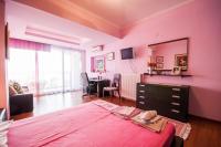Łóżko lub łóżka w pokoju w obiekcie Holidays Pelion