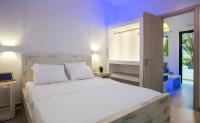 Posteľ alebo postele v izbe v ubytovaní Pahivouni Studios & Suites