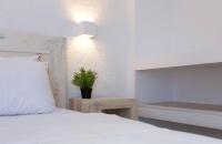Posteľ alebo postele v izbe v ubytovaní Pahivouni Studios & Suites