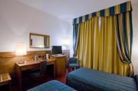 A bed or beds in a room at Hotel Master