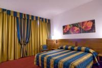 A bed or beds in a room at Hotel Master
