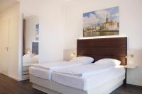 Postel nebo postele na pokoji v ubytování Viva Hotel Lübeck