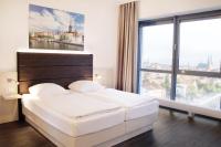 Postel nebo postele na pokoji v ubytování Viva Hotel Lübeck