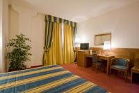 A bed or beds in a room at Hotel Master
