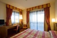 A bed or beds in a room at Hotel Master