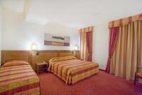 A bed or beds in a room at Hotel Master