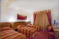 A bed or beds in a room at Hotel Master