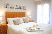 Posteľ alebo postele v izbe v ubytovaní Malaga Center Flat Holidays Paseo de Reding