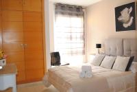 Posteľ alebo postele v izbe v ubytovaní Malaga Center Flat Holidays Paseo de Reding