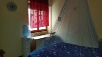 Łóżko lub łóżka w pokoju w obiekcie B&B Le Mille E Una Notte