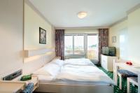 Posteľ alebo postele v izbe v ubytovaní Hotel Walkner