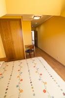 Posteľ alebo postele v izbe v ubytovaní Hotel El Roble