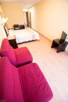 Posteľ alebo postele v izbe v ubytovaní Hotel El Roble