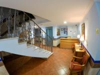 Posedenie v ubytovaní Apartamentos Niña de Oro