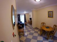 Posedenie v ubytovaní Apartamentos Niña de Oro