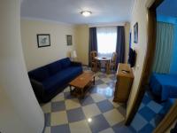 Posedenie v ubytovaní Apartamentos Niña de Oro