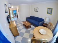 Posedenie v ubytovaní Apartamentos Niña de Oro