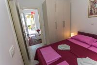 Posteľ alebo postele v izbe v ubytovaní Apartments Palma Ragusa