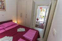 Posteľ alebo postele v izbe v ubytovaní Apartments Palma Ragusa