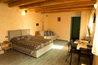 Posteľ alebo postele v izbe v ubytovaní Le Relais du Relax