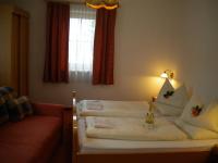 Łóżko lub łóżka w pokoju w obiekcie Apartment Könighaus