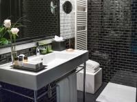 a bathroom with a white sink and a mirror at The Principal Madrid, Small Luxury Hotels in Madrid