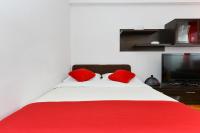 Posteľ alebo postele v izbe v ubytovaní Roman Forum Apartments