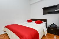 Posteľ alebo postele v izbe v ubytovaní Roman Forum Apartments