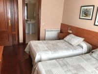 Posteľ alebo postele v izbe v ubytovaní Hostal La Frontera