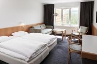 Postel nebo postele na pokoji v ubytování Milling Hotel Vejle