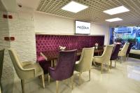 A seating area at Adamel City Hotel